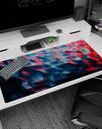Large 40x20 inches mouse pad featuring geometric waves design, with deep blues and reds in a dynamic pattern for a captivating, energy-filled aesthetic.