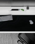 36x16 inches desk pad with Midnight Flow design, capturing deep black wave patterns for a refined and stylish touch in any workspace.