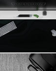 40x20 inches desk pad with Midnight Flow design, showcasing deep black wave patterns for an elegant, sophisticated workspace vibe.
