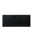 Mouse pad featuring Midnight Flow design, 28x12 inches, with abstract black wave patterns for a refined and minimalist workspace atmosphere.