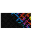Mouse pad featuring neon geometric design, 32x16 inches, with vivid hues of blue, purple, red, and yellow against deep black for striking energy.