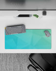 Serene 28x12 mouse pad with clean, overlapping polygons in teal and aqua gradient for a peaceful, refreshing aesthetic