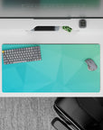 Tranquil 32x16 mouse pad featuring overlapping polygons in teal and aqua gradient for a refreshing, calming design