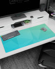 Refreshing 36x16 anime desk mat featuring overlapping polygons and serene teal and aqua gradient for a calming workspace design