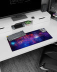 Starry night nebula scene mouse pad 28x12 inches with tiny stars over cosmic swirls.