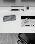 Eerie stillness 14x10 mouse pad with kneeling astronauts, an ominous figure, and a stark manga aesthetic, perfect for creating a mysterious desk vibe