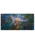 Nebula galaxy desk mouse pad 32x16 inches with teal clouds, inky blues, and starry spark details.