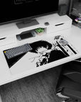 Spike Spiegel from Cowboy Bebop on 32x16 inch monochrome anime mouse pad, depicting him coolly leaning against a city backdrop.