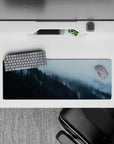 32x12 inches mouse pad featuring a foggy forest with cool blues and greens for a peaceful, outdoor-inspired look.