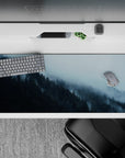36x16 inches mouse pad with a foggy forest, blending cool blues and greens to create a tranquil nature-inspired aesthetic.