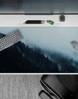 40x20 inches mouse pad with a foggy forest, blending cool blues and greens to bring serenity and tranquility to your workspace.