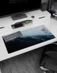 Modern 32x16 inches mouse pad showcasing a misty forest with cool blues and greens for a peaceful, natural workspace.