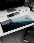 Artistic 36x16 inches mouse pad featuring a misty forest with cool blues and greens for a peaceful and serene workspace.