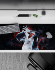 Anime desk pad 36x16 inches featuring tattooed character with neon-red embers on a deep-space black background.