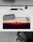 28x12 inches mouse pad with fiery sunset over forest, blending bold colors for a creative and dynamic workspace.