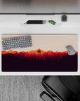 32x16 inches mouse pad with fiery sunset over forest, blending bold colors for a dynamic, creative workspace aesthetic.