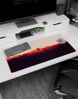 Modern 32x16 inches mouse pad featuring fiery sunset over forest, with bold, vibrant colors to inspire creativity and adventure.