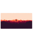 Mouse pad featuring fiery sunset over forest, 32x16 inches, with bold, vibrant colors to add creativity and energy to your desk.