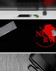 Neon Genesis Evangelion desk pad 40x20 inches featuring NERV insignia, crimson red on matte black with "God’s in His Heaven" quote.