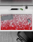 32x16 inches mouse pad with 3D geometric pattern, showcasing soft pinks and reds in a gradient for a textured, bold, and minimalist aesthetic.