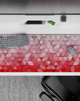 36x16 inches mouse pad with 3D geometric pattern, blending soft pinks and reds in a gradient for a minimalist and dynamic design with visual interest.
