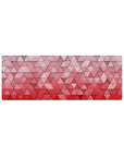 Compact 32x12 inches mouse pad with 3D geometric pattern, blending soft pinks and reds in a gradient for a bold, minimalist design.