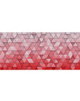 Mouse pad featuring 3D geometric pattern, 36x16 inches, with soft pinks and reds in a gradient for a bold, modern design with textured depth.