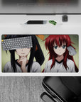 Mouse pad featuring Rias and Akeno from High School DxD, 32x16 inches, showing their contrasting moods in gym attire.