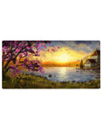Mouse pad featuring sunset glow, 32x16 inches, with cherry blossoms and serene waters for a calming, reflective vibe.