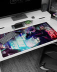 Large 40x20 inches desk pad with Satoru Gojo in front of a vibrant neon city, exuding cool confidence and power for any Jujutsu Kaisen fan.