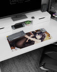 Playful anime girl stretching on wooden floor with phone and bunny plushies, mouse pad 28x12 inches.