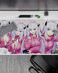 Cozy blush-pink anime desk pad 40x20 inches with icy silver hair, bright blue eyes, hoodie vibe.