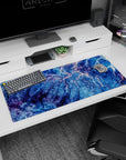 Artistic 36x16 inches mouse pad featuring topographic-inspired design, with deep blues, purple, and pink to bring nature’s majesty to your desk.