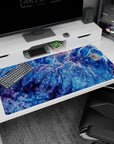 Large 40x20 inches mouse pad featuring topographic-inspired lines in deep blues, purple, and pink to evoke mountain ranges and valleys in your desk.