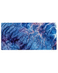 Mouse pad featuring topographic-inspired design, 32x16 inches, with deep blues, purple, and pink lines evoking mountain ranges and valleys for a serene look.