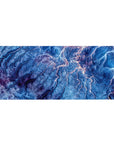 Mouse pad featuring topographic-inspired design, 36x16 inches, with deep blues, purple, and pink for a majestic, nature-filled workspace effect.