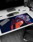 Fiery 40x20 anime desk mat showcasing deep blues, fiery reds, and Zero Two’s piercing green eyes for intense energy
