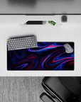 28x12 inches mouse pad with neon-infused waves of vivid blues and magentas against a dark backdrop, creating a bold and dynamic workspace aesthetic.