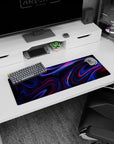 Artistic 32x12 inches mouse pad with neon-infused waves of vivid blues and magentas against a dark background for a dynamic and modern look.