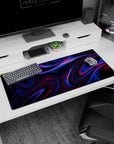 Artistic 36x16 inches mouse pad featuring neon-infused abstract design, with vivid blues and magentas rippling across a dark backdrop for modern flair.