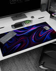 Large 40x20 inches mouse pad with neon-infused abstract design, featuring vivid blues and magentas rippling across a dark backdrop for bold movement.