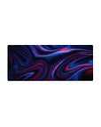 Mouse pad featuring neon-infused abstract design, 28x12 inches, with vivid blues and magentas rippling across a dark background for sleek energy.