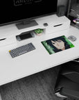 Sasuke Uchiha Rinnegan portrait anime mouse pad 14x10 inches with soft green blur behind him.
