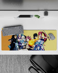 Warm gold background anime mouse pad 32x12 inches with bold reds, blues, and steel tones, high energy.
