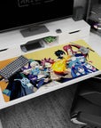Natsu flame punch center scene on anime desk pad 40x20 inches with Lucy and Erza close by.