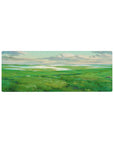 Compact 32x12 inches mouse pad featuring rolling green hills and shimmering waters for a serene, open workspace.