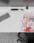 Soft pastel desk pad 40x20 inches in candy-floss pink and white, cozy cute mood with coral-red accents.