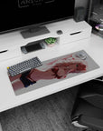 Artistic 32x12 inches mouse pad featuring Zero Two design, with deep contrasts and bold reds for a striking, high-energy anime aesthetic.