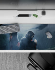Moody deep blue and smoky gray anime desk pad with red Akatsuki clouds, 36x16 inches.