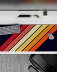 36x16 inches mouse pad with a diagonal stripe pattern, featuring warm orange, red, and yellow tones against a navy background for a vintage touch.